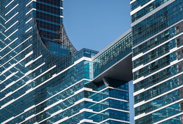 Skybridge between two law firms representing lateral career moves and professional transitions